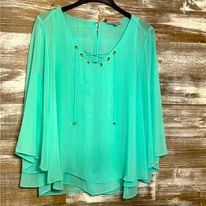 Jennifer Lopez Teal blouse with tie front and gold grommets, size Large